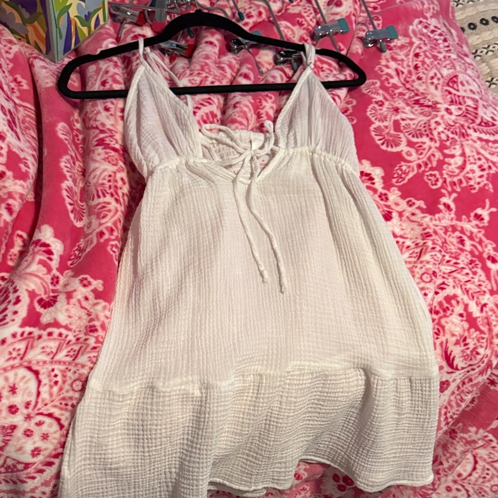 White Sleeveless Top with Lace-Up Detail